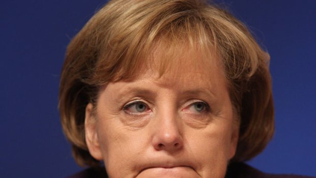 FROWN: German Chancellor Angela Merkel frowns during the 21st party congress of the German Christian Democratic Party.
