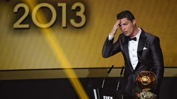 Real Madrid forward Cristiano Ronaldo delivers a speech after receiving the 2013 FIFA Ballon d'Or award for player of the year.
