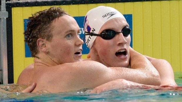 How fast?: David McKeon, celebrating with Mack Horton, docked 1:46.93 in qualifying fastest for Wednesday night's 200 metres freestyle final.
