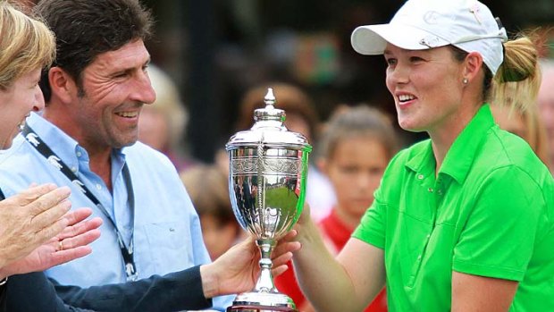Rising star ... Stacey Keating holds the French Open trophy with Jose Maria Olazabal in Saint-Jean-de-Luz. It was Keating's second successive win on the Ladies European Tour.