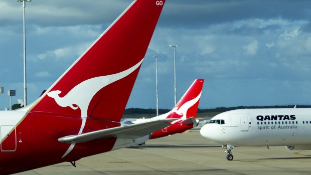 Qantas and American Airlines plan to add at least two new trans-Pacific routes over the next five years if they receive final regulatory approvals for their joint venture.