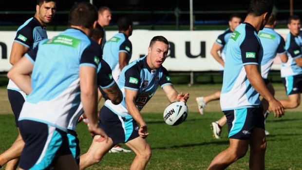 Cool Blue: Rookie Origin five-eighth James Maloney gets down to business with the NSW team during a training session at Coogee Oval on Monday.