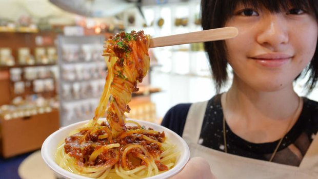 Appetising? A plastic bowl of spaghetti with a spoon in Tokyo.