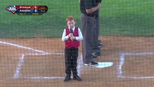 Ethan Hall takes a deep breath before starting the national anthem with a case of the hiccups.