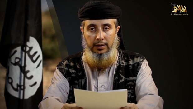 A video grab taken from a propaganda video released on December 4, purportedly shows Nasser bin Ali Al-Ansi, of Al-Qaeda in the Arabian Peninsula, reading a message threatening to kill US hostage Luke Somers, 33. 