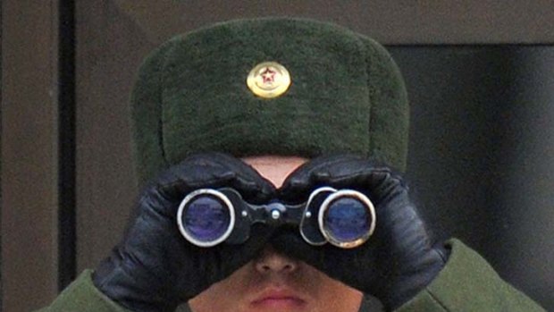 On watch ... a North Korean soldier looks south.