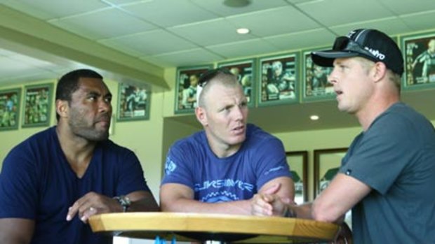 Board meeting...world surfing champion and Penrith fan Mick Fanning, right, with Petero Civinoceva and Luke Lewis.