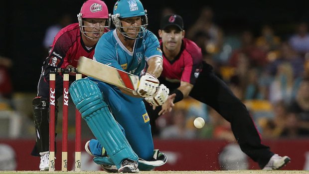 Brisbane Heat opener Luke Pomersbach reverse sweeps against the Sixers at the Gabba.