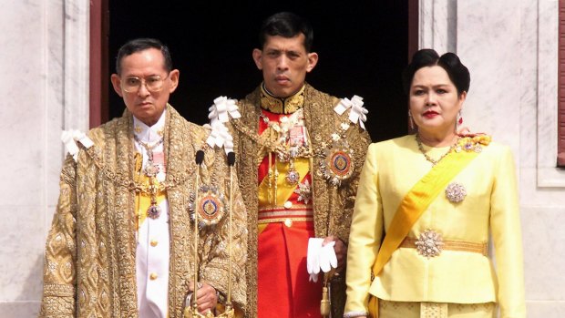 King Bhumibol Adulyadej, Crown Prince Maha Vajiralongkorn and Queen Sirikit in 1999.