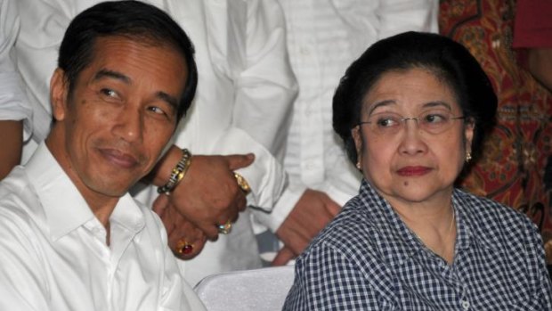 Jokowi with his mentor and matriarch of the PDI party, Megawati Sukarnoputri.