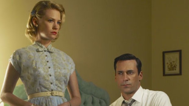 Betty and Don Draper from Mad Men (above) and below, the dolls made in their likeness.