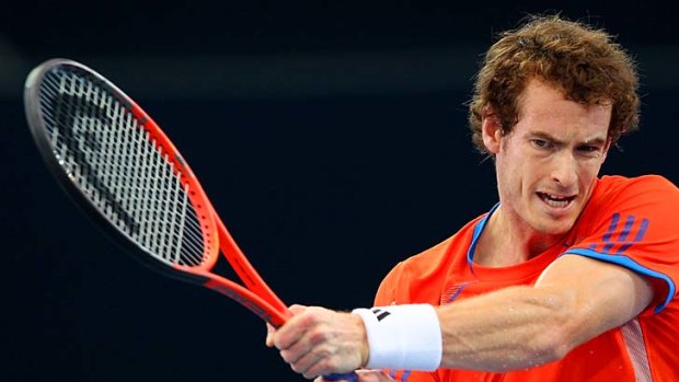 Andy Murray fires off a backhand in his semi-final against Bernard Tomic at the Brisbane International.