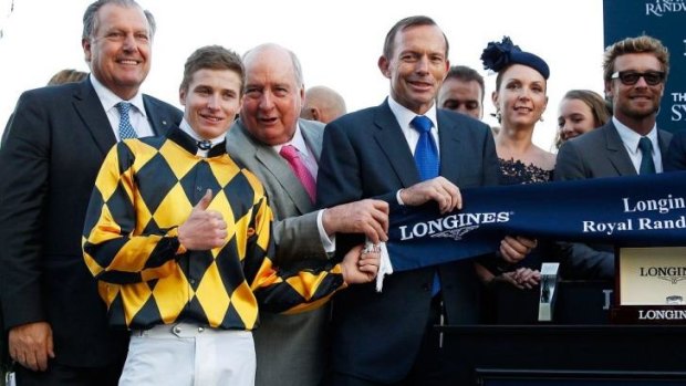 The rich, powerful and famous: Royal Randwick attracted luminaries such as Prime Minister Tony Abbott, actor Simon Baker and radio broadcaster Alan Jones to the Championships.