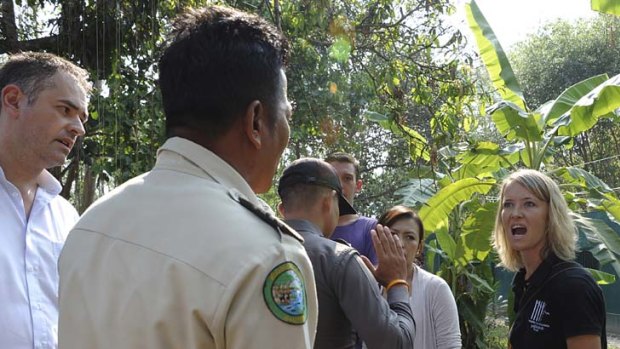 Heated stand-off... Sydney vet and the Wildlife Friends Foundation Thailand manager, Lucy Clark, confronts Thai park officials during the raid.