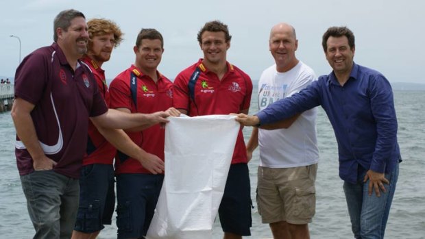 CEO Doug Flockhart along with local Redlands MPs Steve Davies and Mark Robinson and Queensland Reds players, Eddie Quirk, Greg Holmes and Jake Schatz.