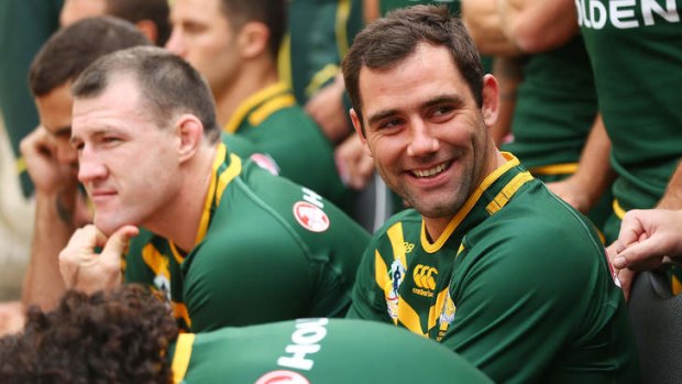 On the ball: Cameron Smith with his Kangaroos teammates during as World Cup team photo session.