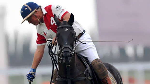 Energetic ... James Ashton takes to the field during one of his many polo matches.