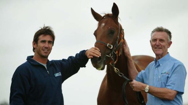 Return: Col Keane, right, pictured with Knights Eagle and rugby league legend Andrew Johns in 2004, will return to NSW racing for the first time in three years on Saturday.