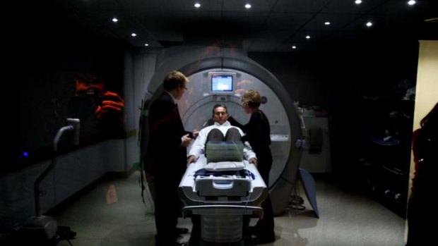 "I just freeze for no reason" ... Parkinson's sufferer John Marshall undergoes an MRI scan.