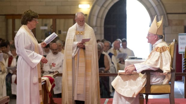 A congregation watches on as Archdeacon Alison Taylor is consecrated as Queensland's first Anglican woman bishop at St John's Cathedral in Brisbane.