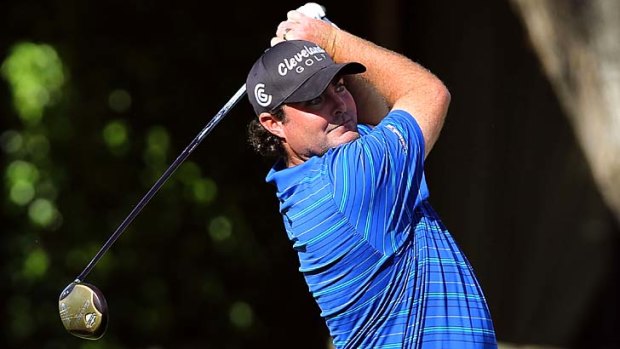 Steven Bowditch hits a tee shot into the water during the sixth round of qualifying school.