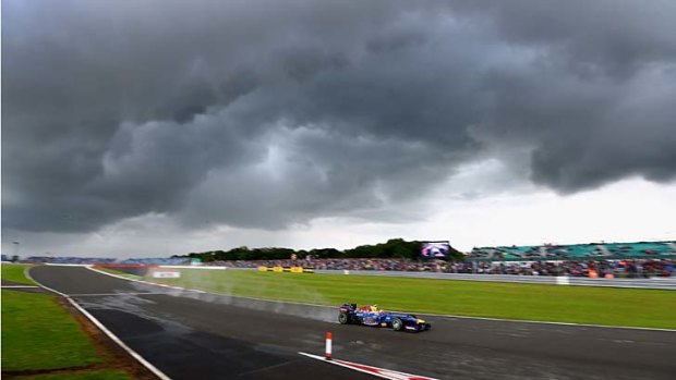 Mark Webber of Australia claimed a spot on the front row grid in trying conditions at Silverstone.
