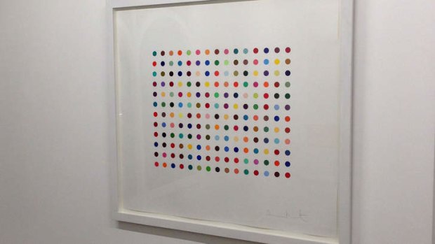 A signed print of Damien Hirst's 2005 'spot' artwork <i>Pyronin Y</i>, which was stolen from a London art gallery.