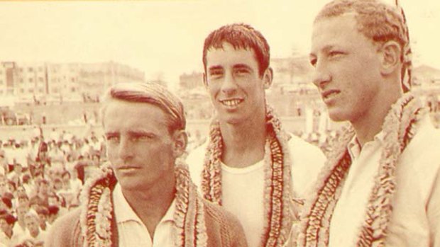 Keli's father Robert (middle) with fellow champion surfers Mick Dooley and Nat Young at Bondi Beach in 1963.