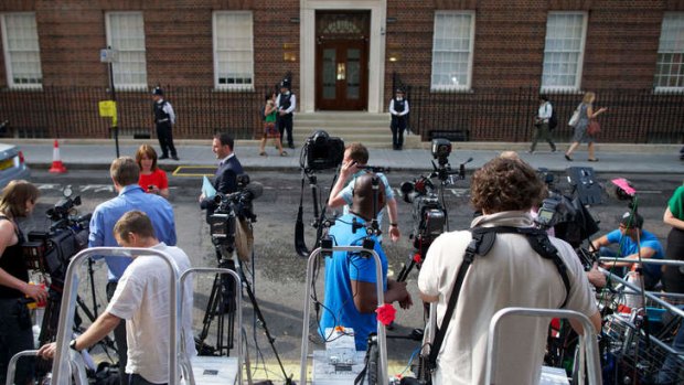 Hundreds of media crews from around the word wait outside the Lindo Wing of Saint Mary's Hospital in Paddington.