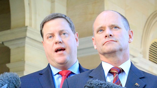 Cutting public service jobs for the good of the state's coffers 'is not a task we relish', Tim Nicholls, pictured with Campbell Newman, says.