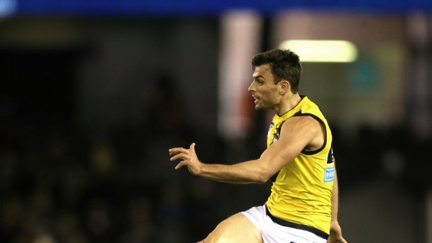 Richmond's Sam Lloyd kicks a goal 
 in the VFL grand final.Picture: