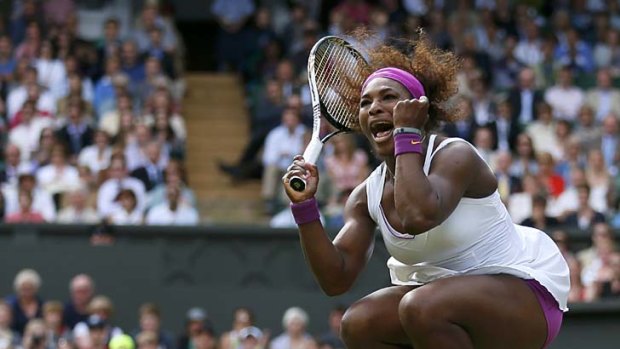 Jumping for joy ... Serena Williams through to the fourth round.