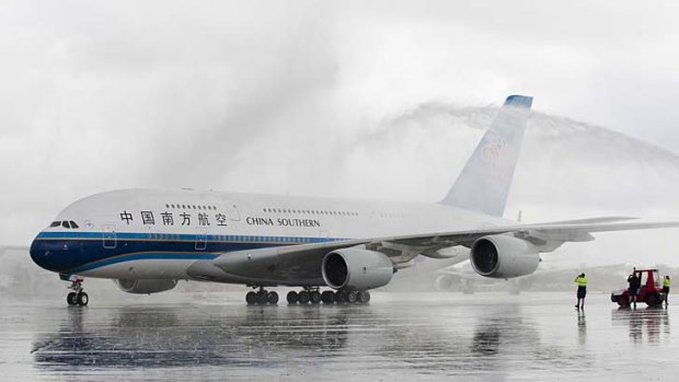 China Southern's first A380 flight to Australia is greeted by a water cannon salute at Sydney Airport.