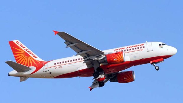 India's aviation minister claims some staff have been costing Air India millions through theft, fraud and abuse of perks.
