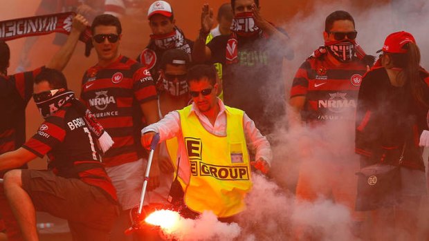 Smoked out ... Wanderers fans, who have copped plenty of heat this season for flares in the A-League, turned up in droves to see their side go down 3-2 to Sydney FC in the final round of the W-League season.