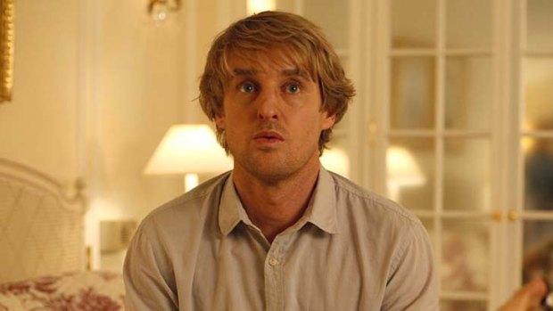 Baby daddy: Owen Wilson contemplates life in a scene from Midnight in Paris.