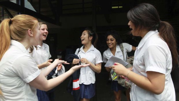 Relief: Willoughby Girls High students celebrate after finishing their maths exam.