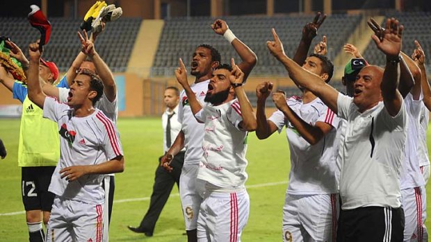Something to shout about  ... in its first game since the rebels seized control of the capital, Tripoli, Libya’s soccer team has celebrated a 1-0 win against Mozambique.