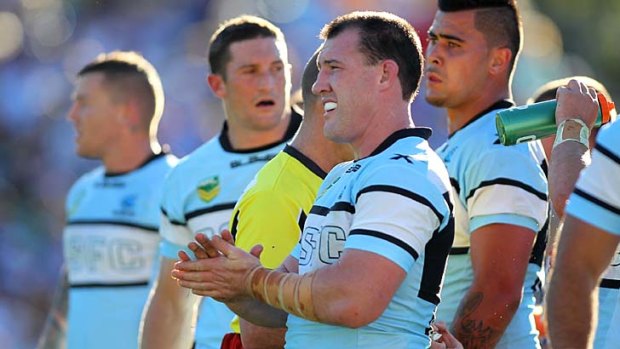 Tough day: Paul Gallen feels the heat on Sunday.