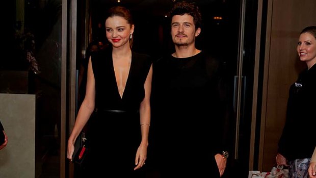 Back on show ... Miranda Kerr and Orlando Bloom stride down the red carpet.