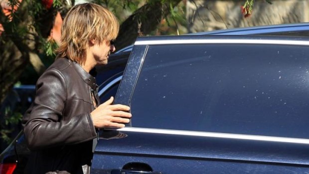 Nicole Kidman's husband, singer Keith Urban, leaves Antonia Kidman's house on Sunday.
