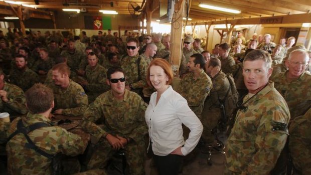 Prime Minister Julia Gillard meets with Australian Defence Force personnel for a BBQ lunch during her visit to the Multi-National Base in Tarin Kowt.