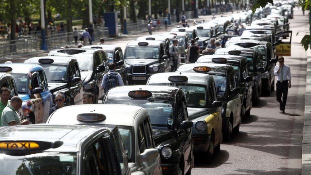 London taxi cabs parked in protest against Uber in 2014.