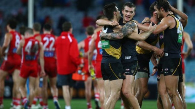 Richmond's Nathan Gordon and Dustin Martin celebrate victory over Sydney.