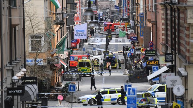 The chaotic scene in central Stockholm after a truck drove through pedestrians and into a department store.