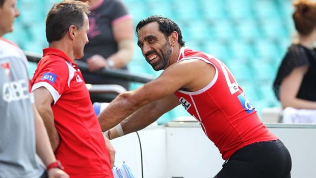 Adam Goodes shares a laugh with club doctor Nathan Gibbs at training on Tuesday.