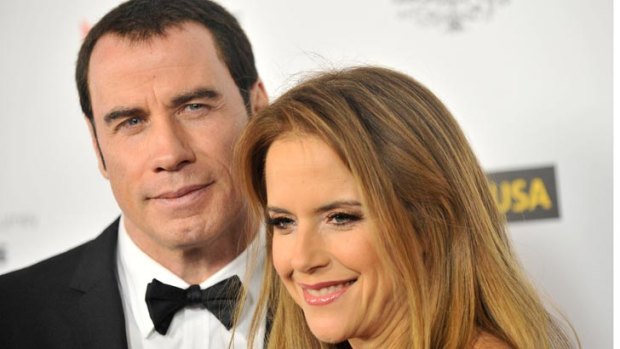 John Travolta with his wife Kelly Preston.