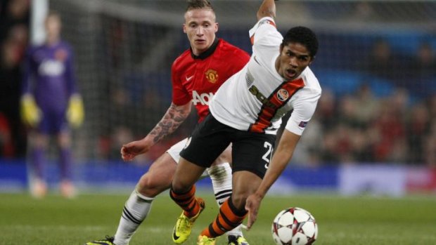 Shakhtar Donetsk's Douglas Costa (right) playing Manchester United at Old Trafford last year.
