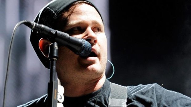 Blink-182 singer/guitarist Tom DeLonge denies quitting the band.