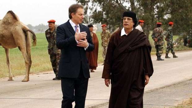 Business ... Blair and Gaddafi in Tripoli in 2004.